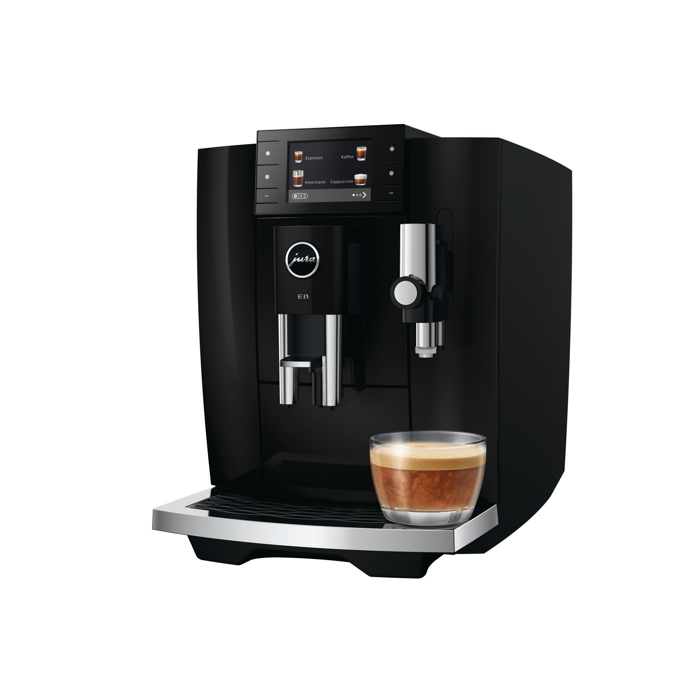 Macchina da caffè nera con touchscreen e un bicchiere di espresso.