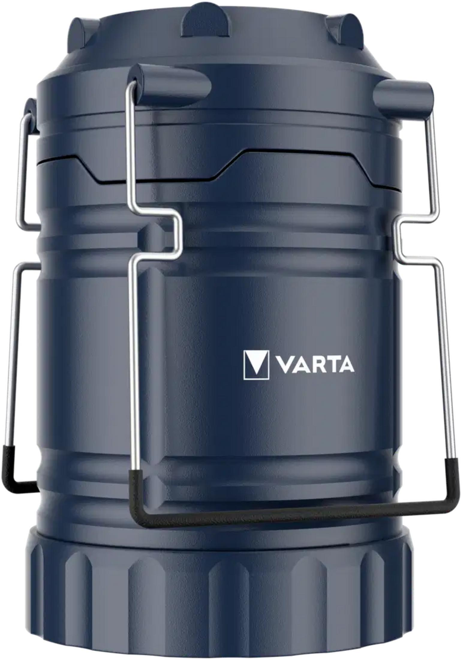 Linterna Varta azul oscuro con asas plateadas y base acanalada.