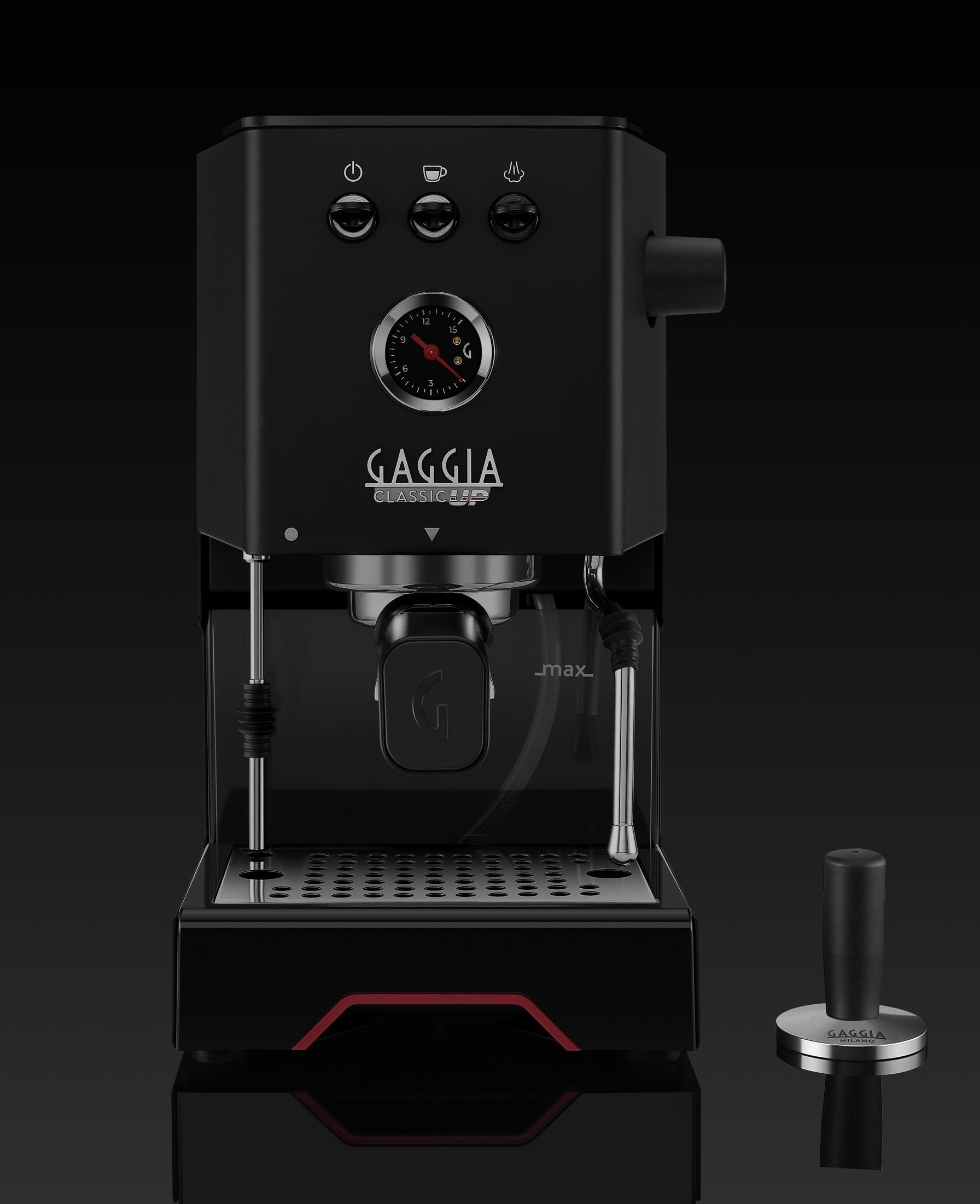 Macchina per espresso nera con manometro e pressino.
