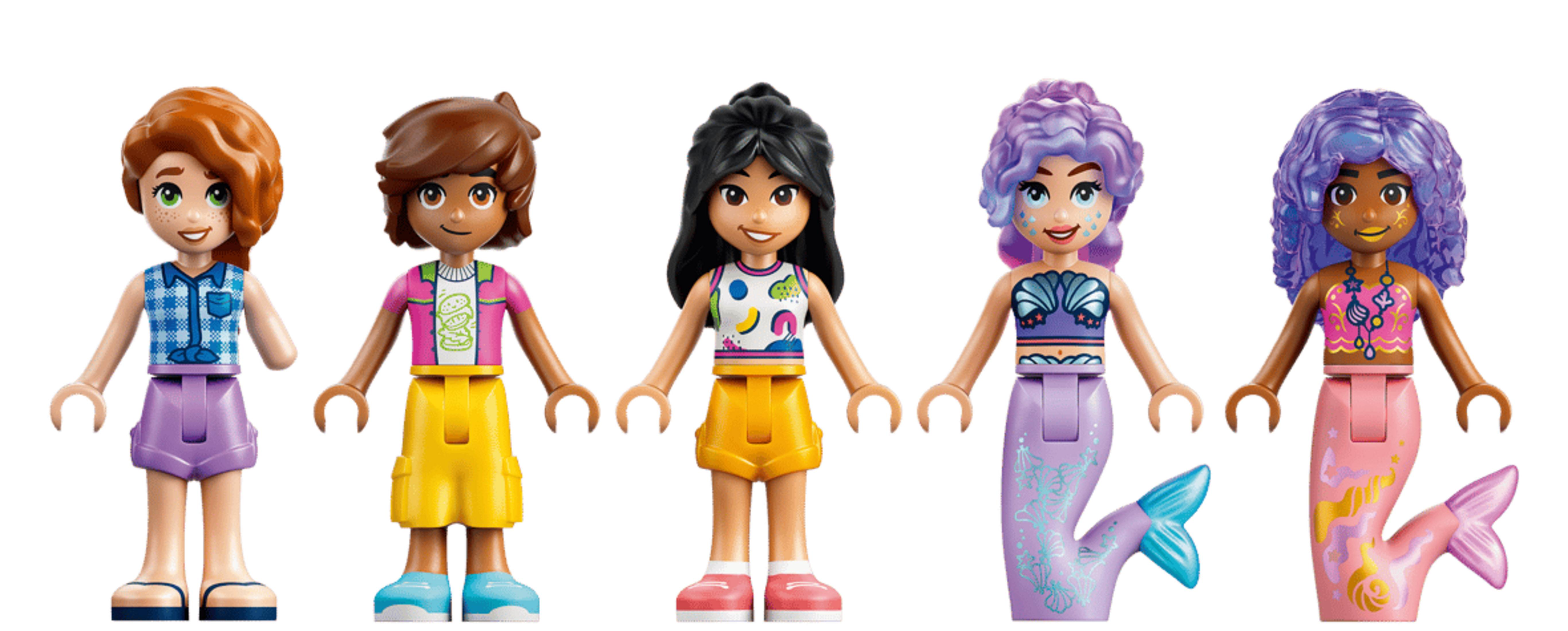 Cinco amigas de Lego, tres niñas y dos sirenas, de pie una al lado de la otra.