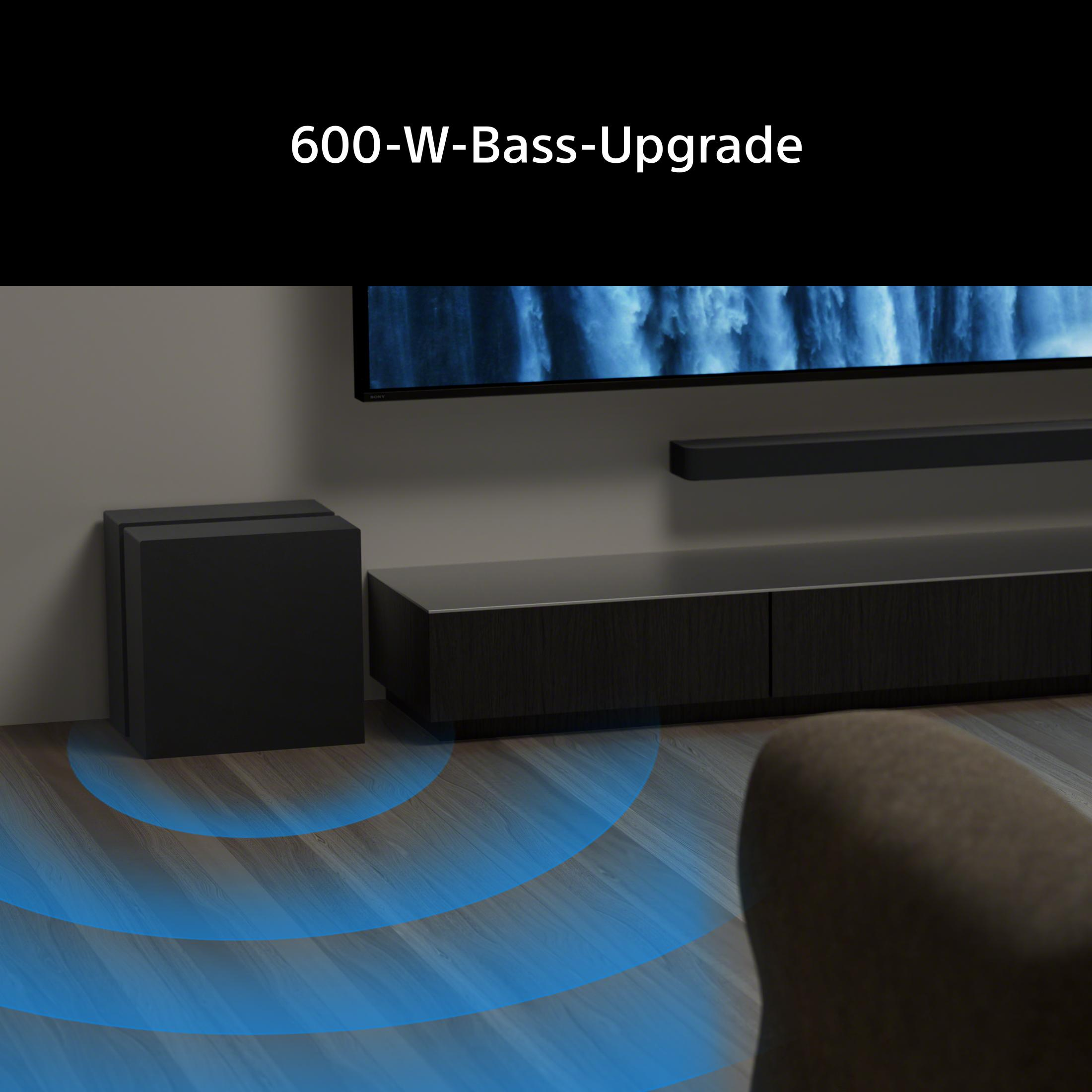 Schwarzer Subwoofer mit blauen Schallwellen auf Holzboden.