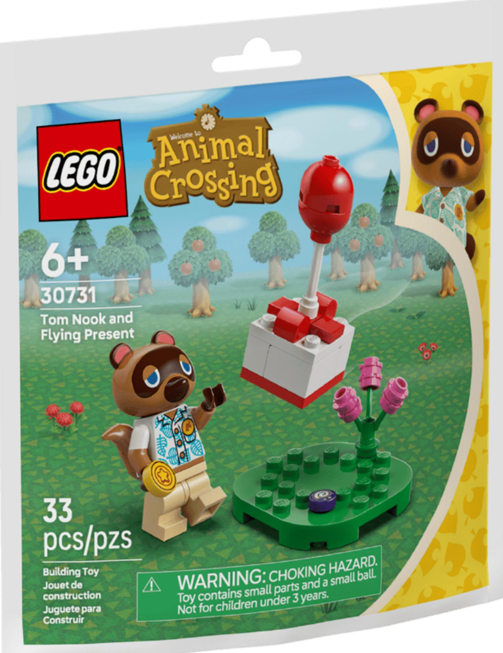 Tom Nook, uçan hediye, ağaçlar ve çiçekler içeren LEGO Animal Crossing seti.