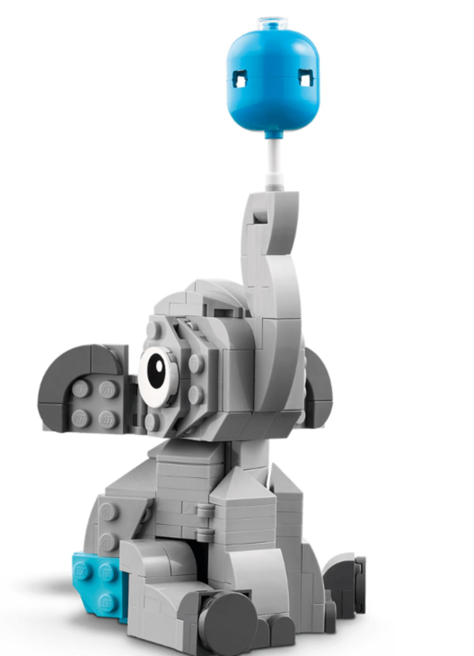 Elefante Lego grigio con un palloncino blu in testa.
