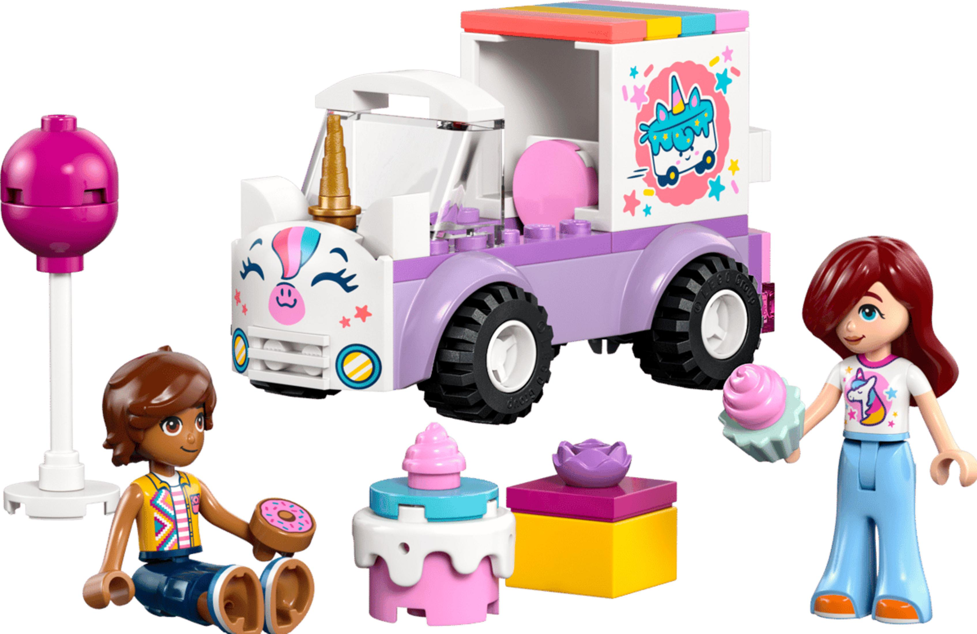 Ein Einhorn-Eiswagen mit zwei Figuren, einem Lolli, einem Kuchen und einem Geschenk.