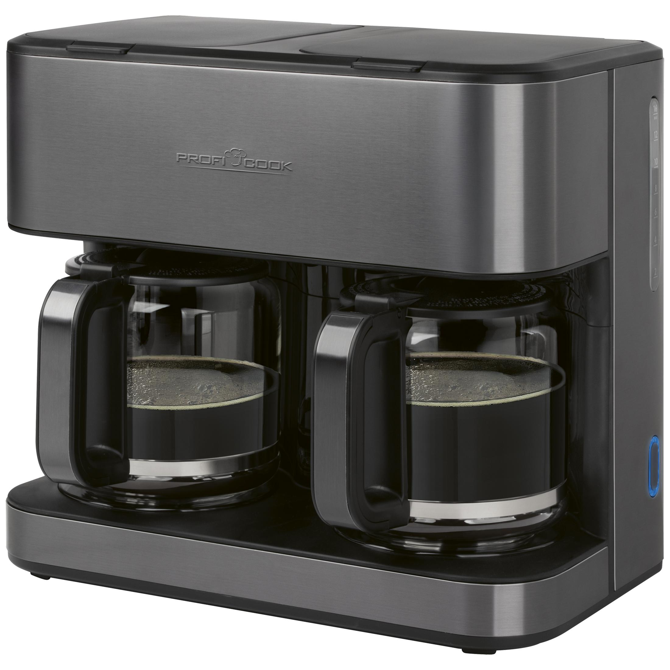 Zwei Kaffeekaraffen mit dunklem Kaffee auf einer doppelten Kaffeemaschine.