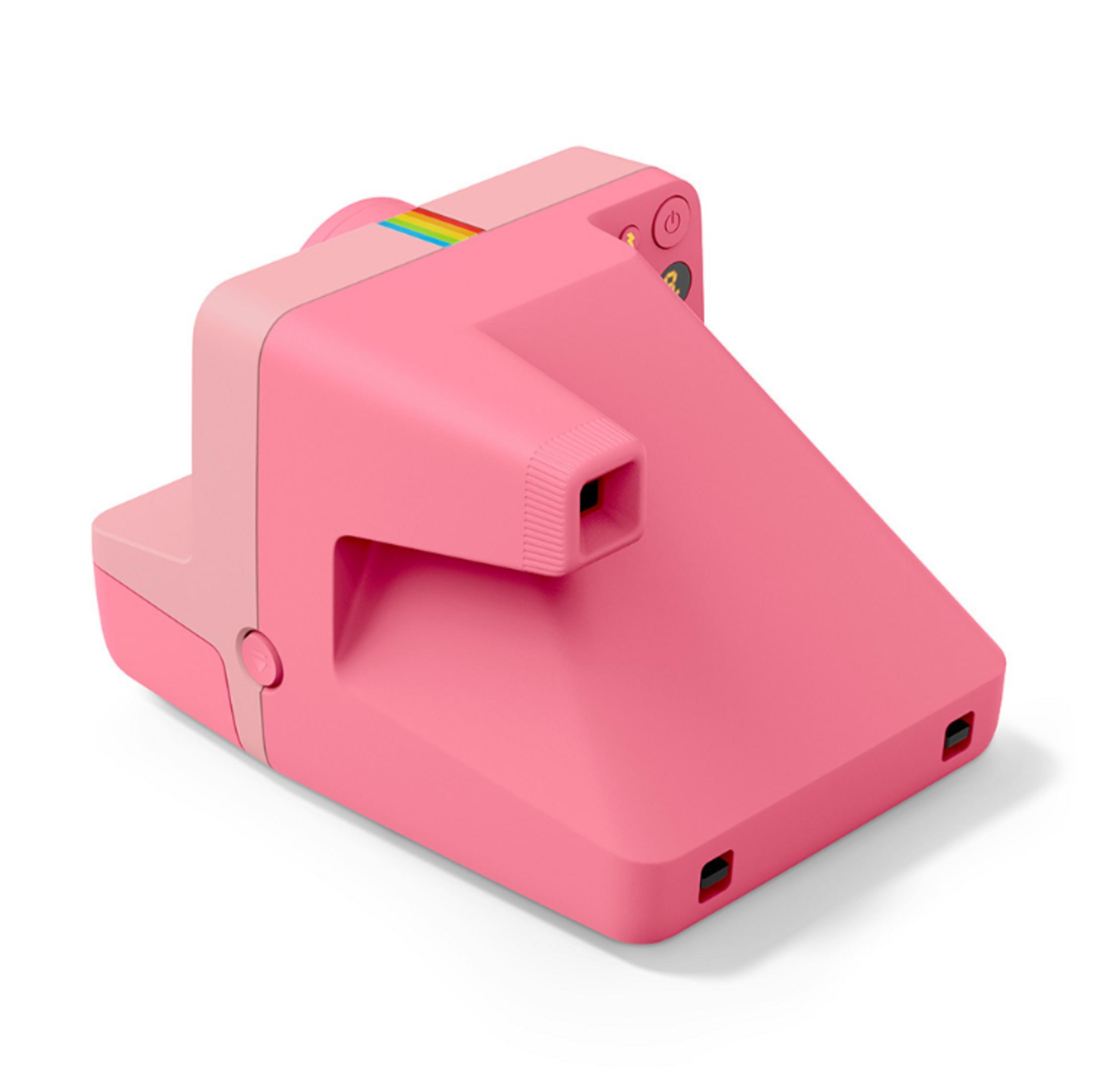 Ein pinker Polaroid-Kamera mit Regenbogen-Detail und schwarzen Knöpfen.