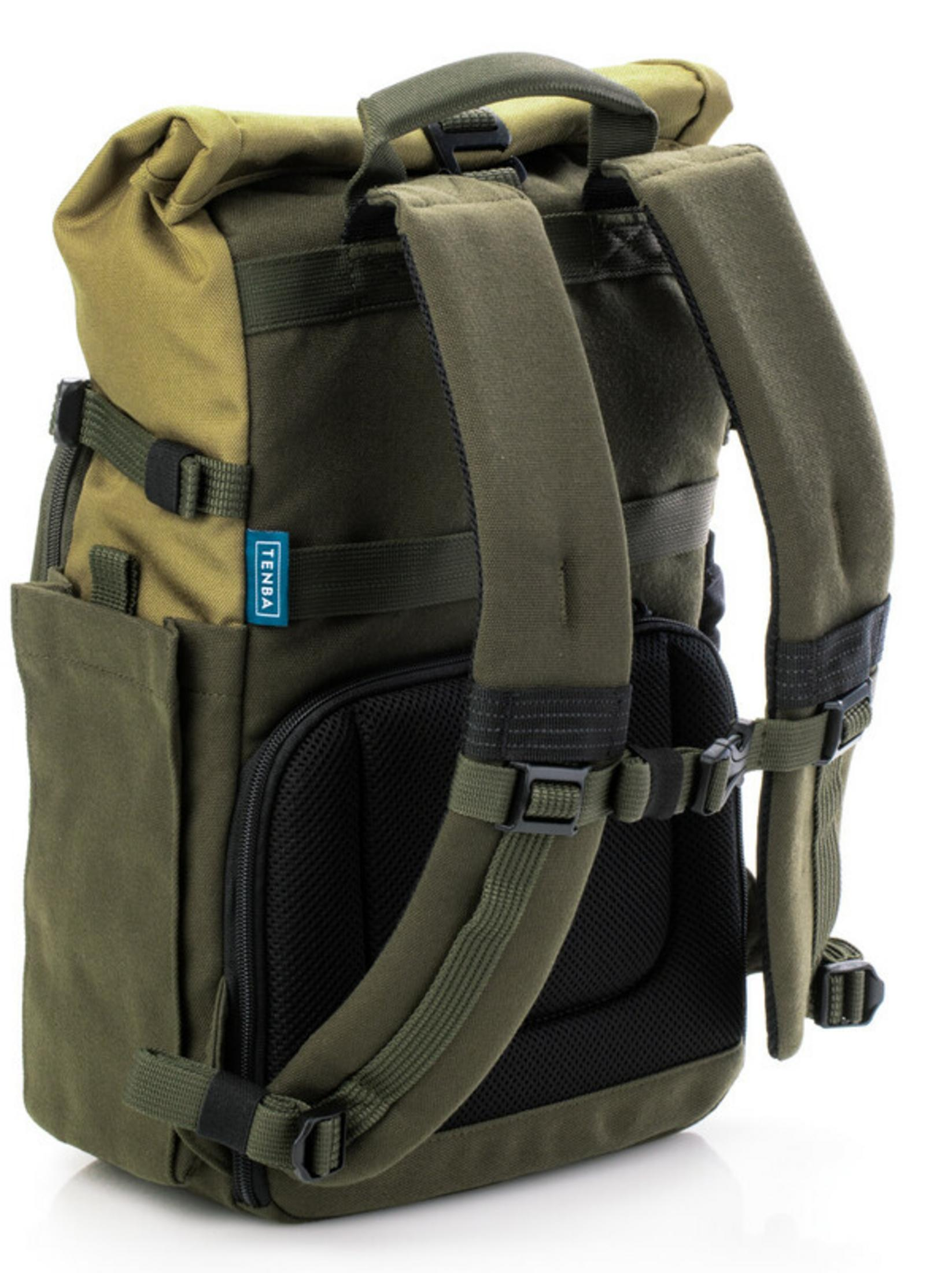 A green backpack with adjustable straps and mesh padding is shown from the back.