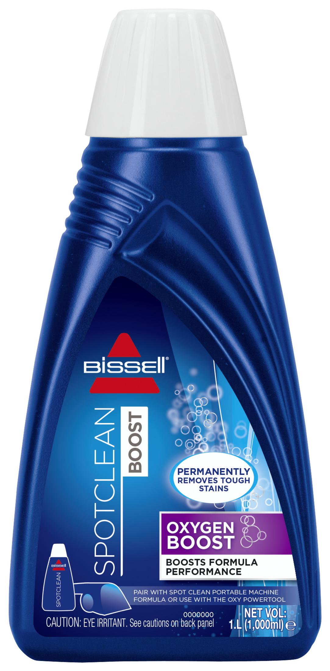 Dunkelblaue Flasche mit weißem Deckel, für Teppichreiniger mit Etikett.