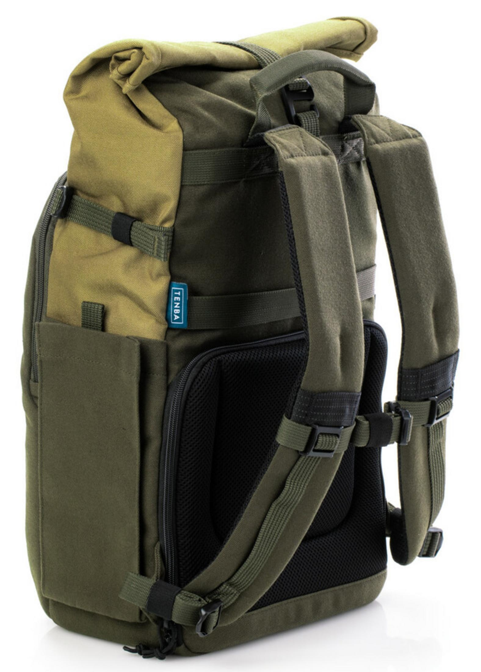 A green backpack with a rolled-top closure and black mesh padding.
