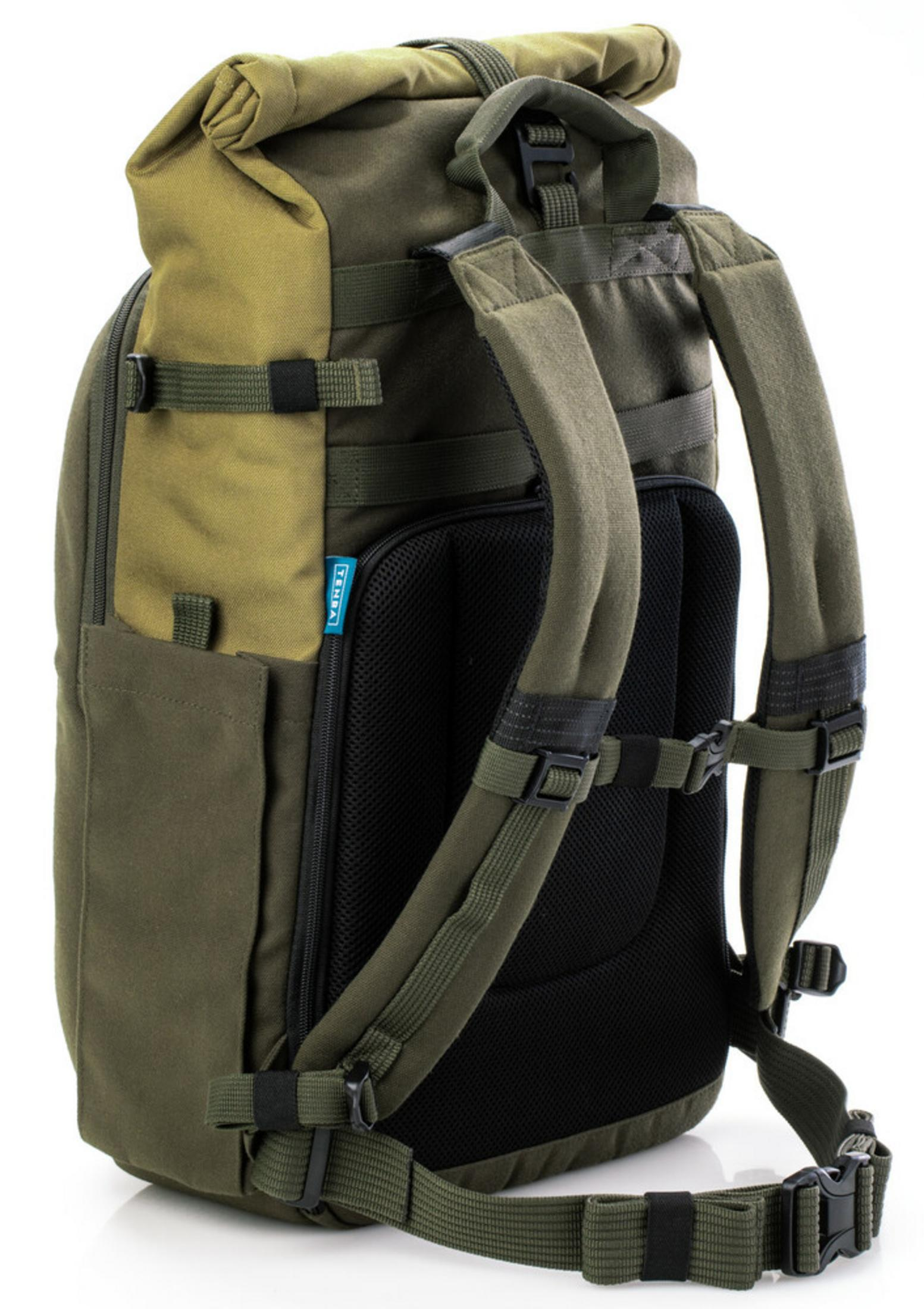 A dark green backpack with a rolled-top main compartment and padded straps.