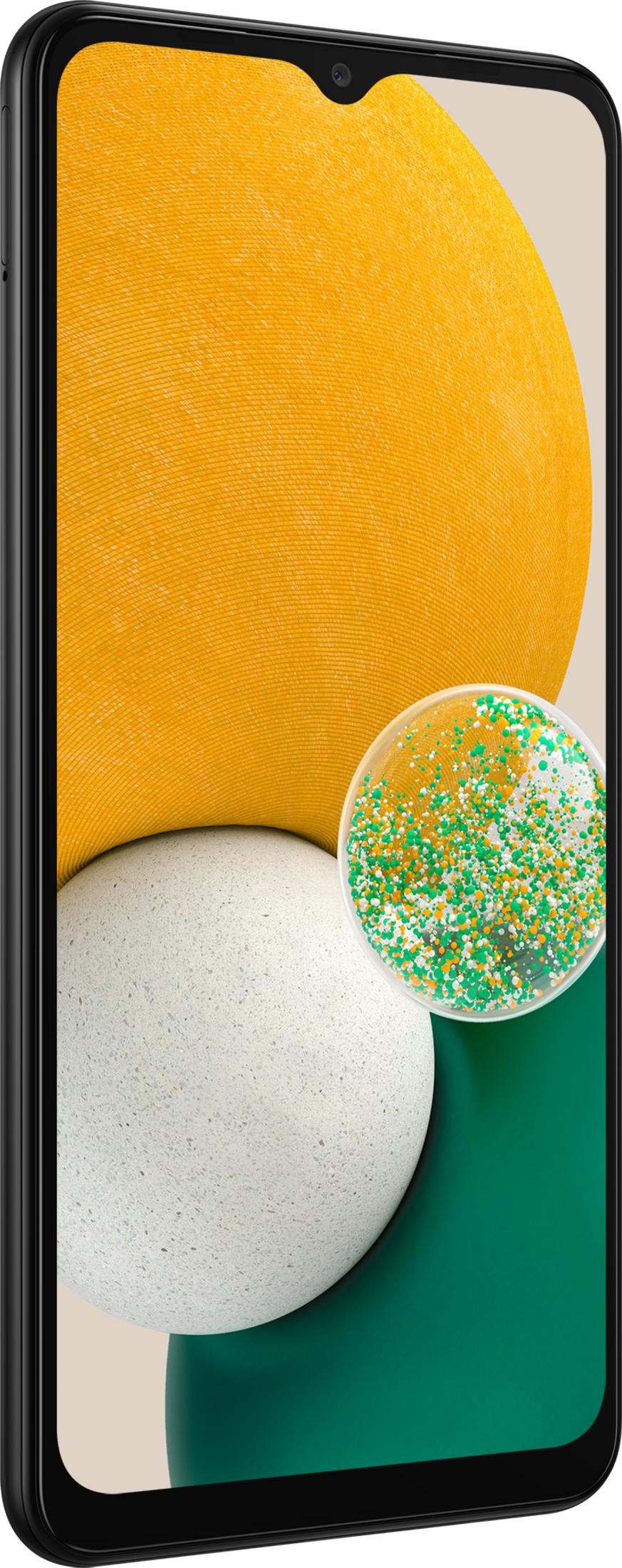 Un smartphone que muestra un fondo de pantalla amarillo, blanco y verde. Se ve un pequeño círculo con purpurina.