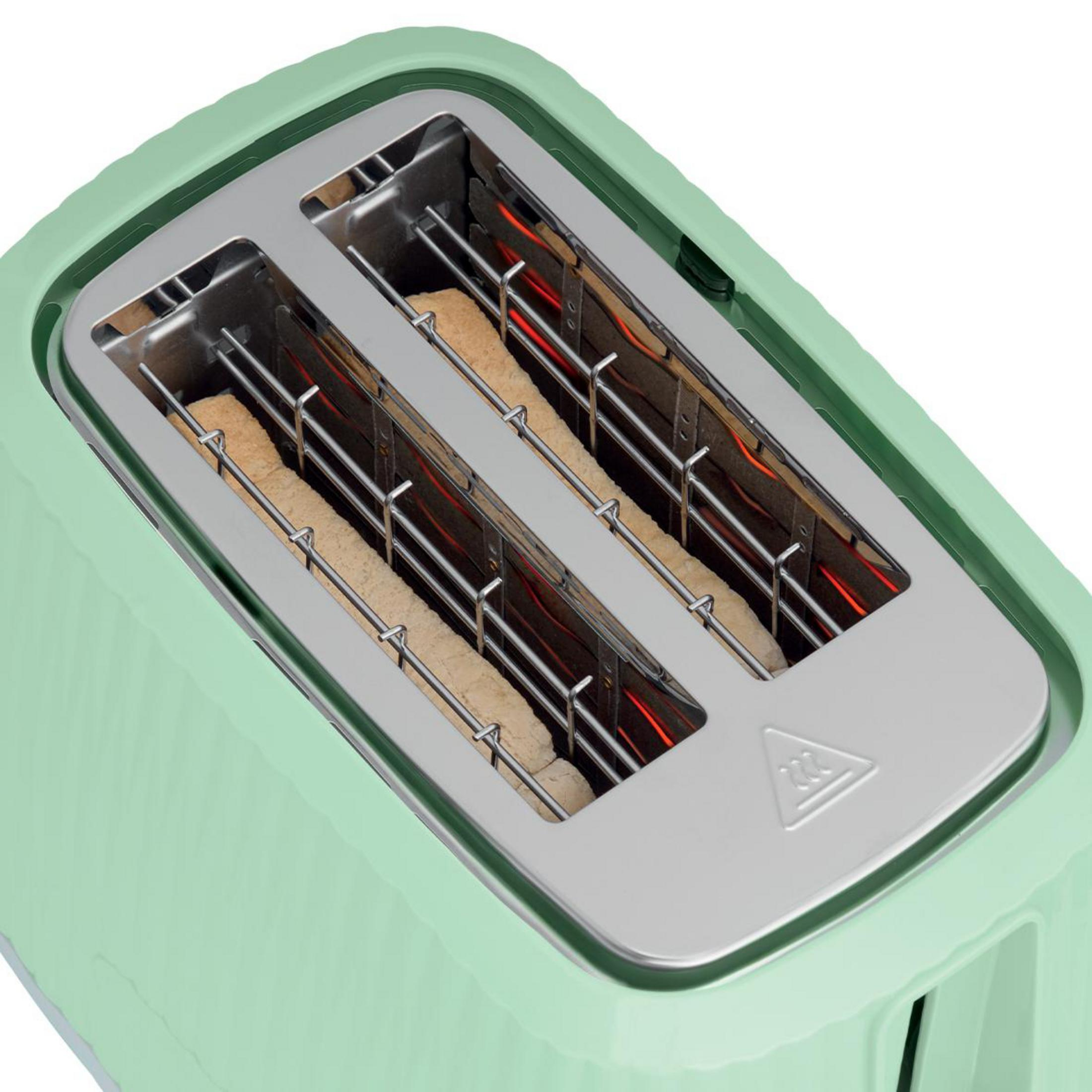 Ein grüner Toaster mit zwei Brotscheiben, die toasten.