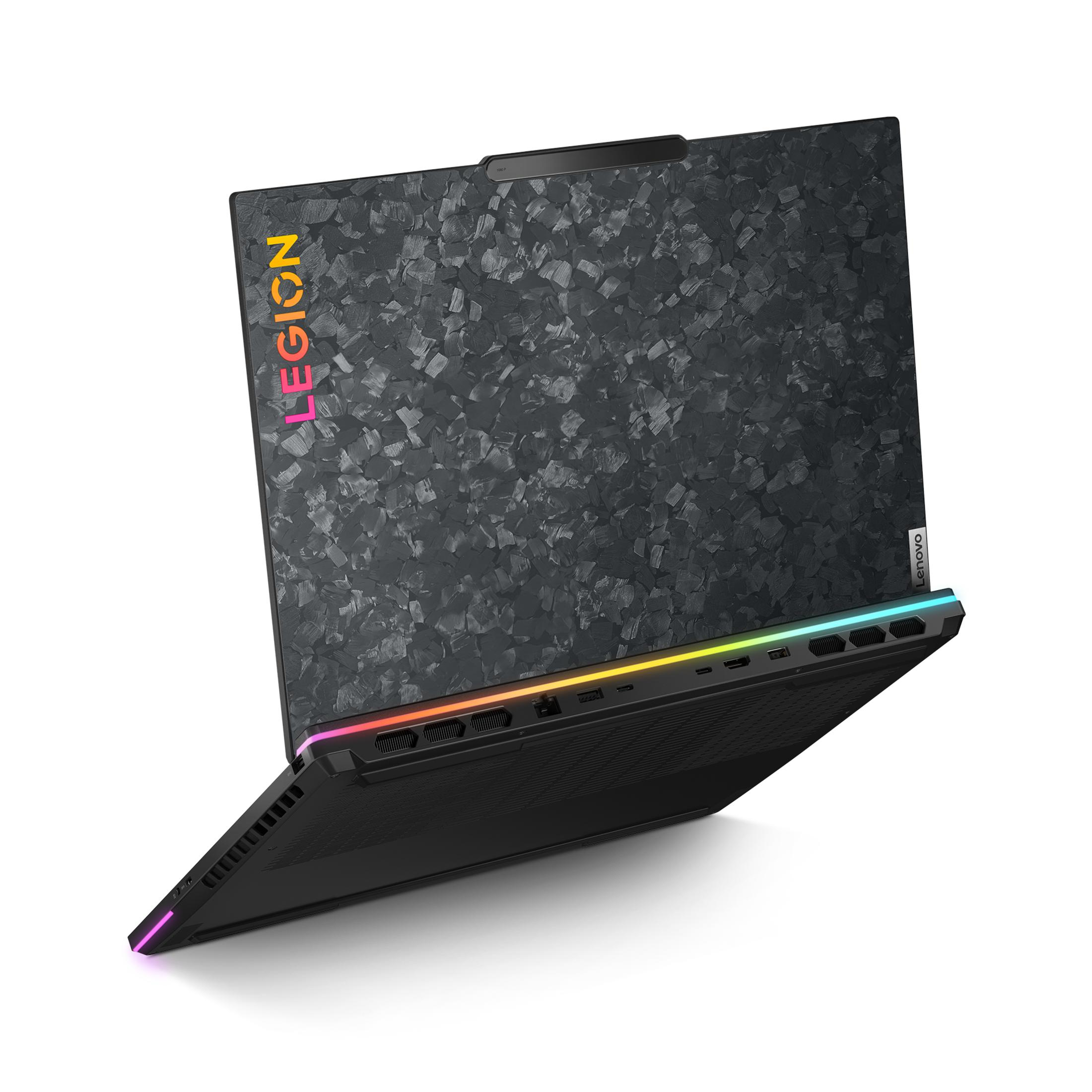 Ein schwarzer Laptop mit grauem Muster und bunten Lichtern.
