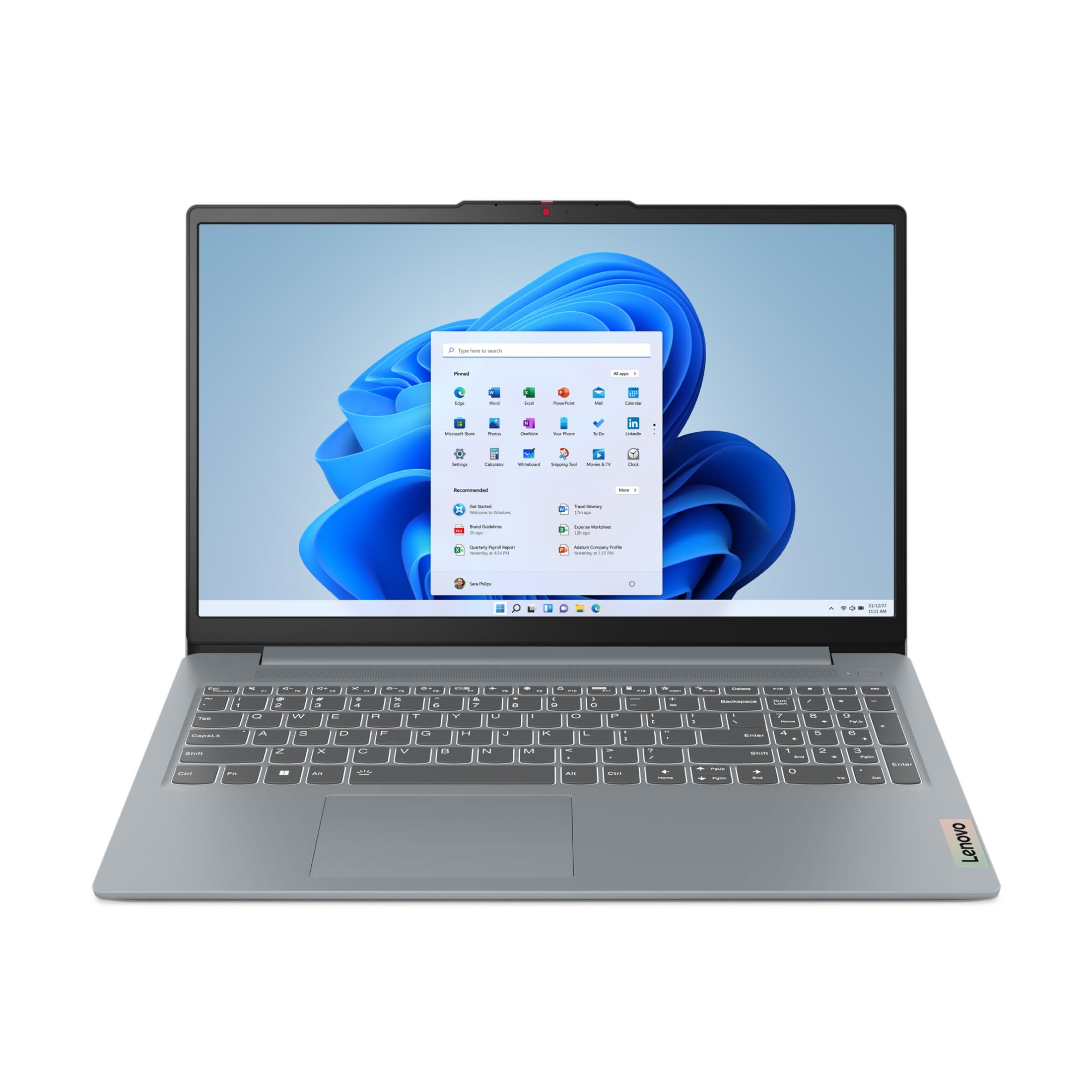 Ein silberner Laptop mit beleuchteter Tastatur und Windows 11-Startmenü.