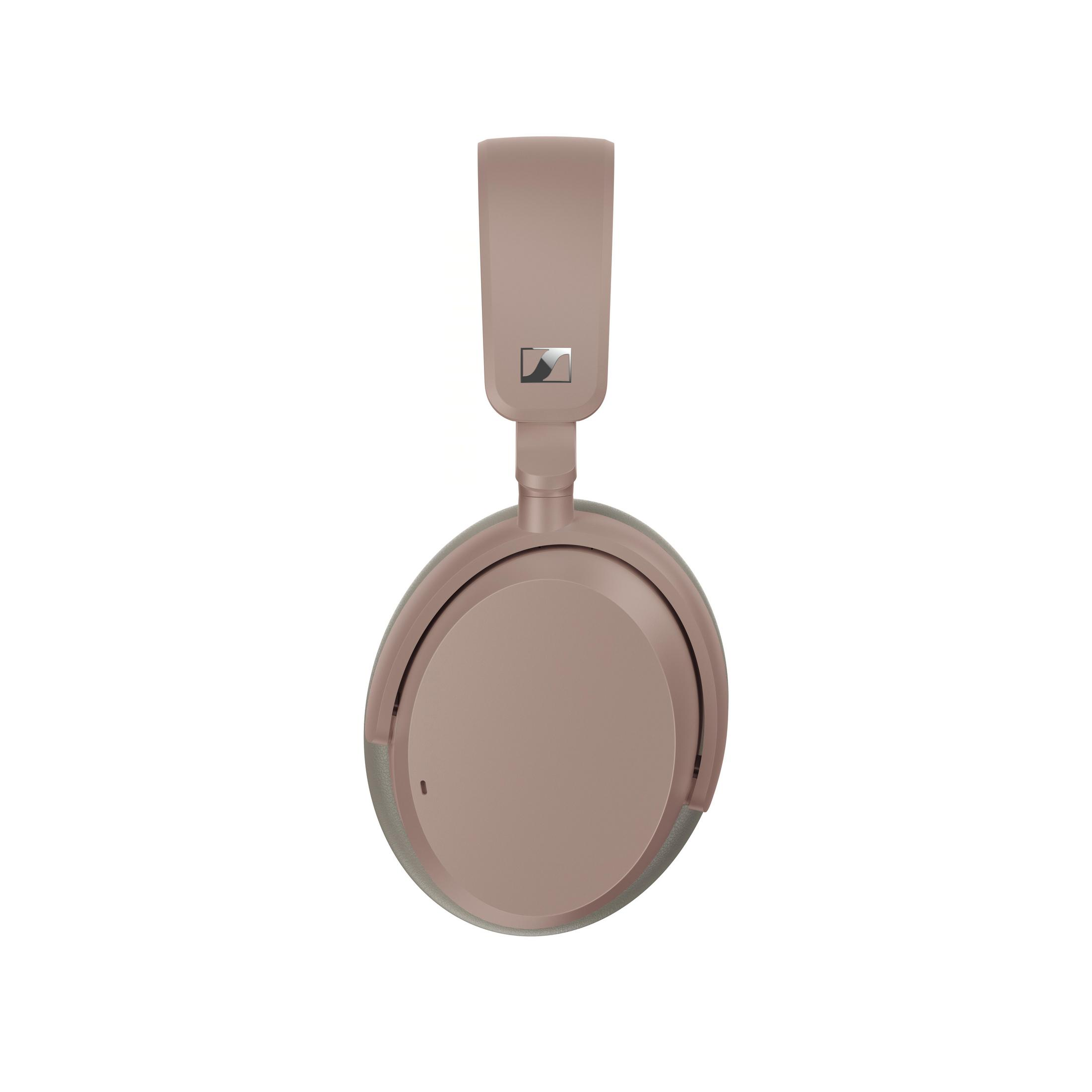 Un paio di cuffie color oro rosa con logo argentato sull'archetto.