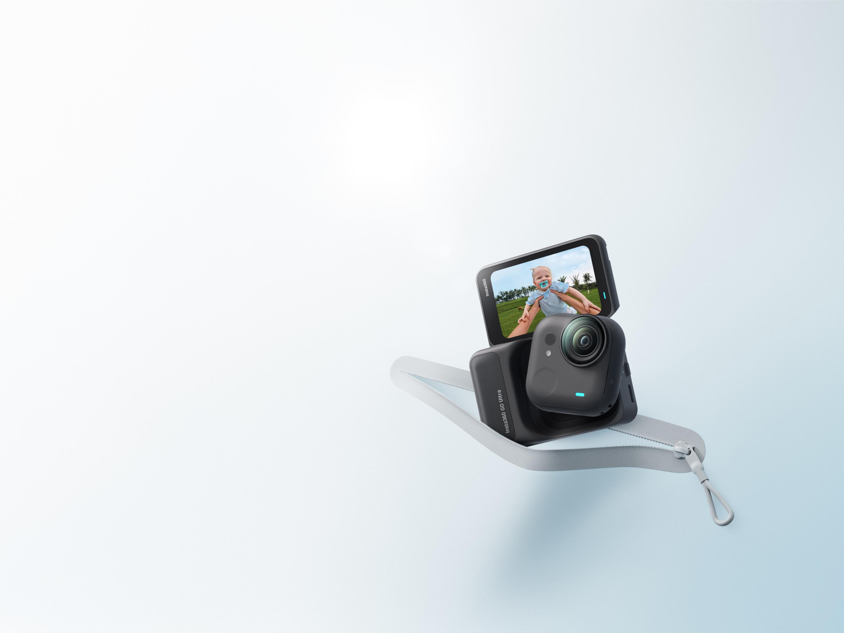 Ein schwarzes Insta360 GO Ultra auf einer Schlaufe, das ein Baby zeigt.