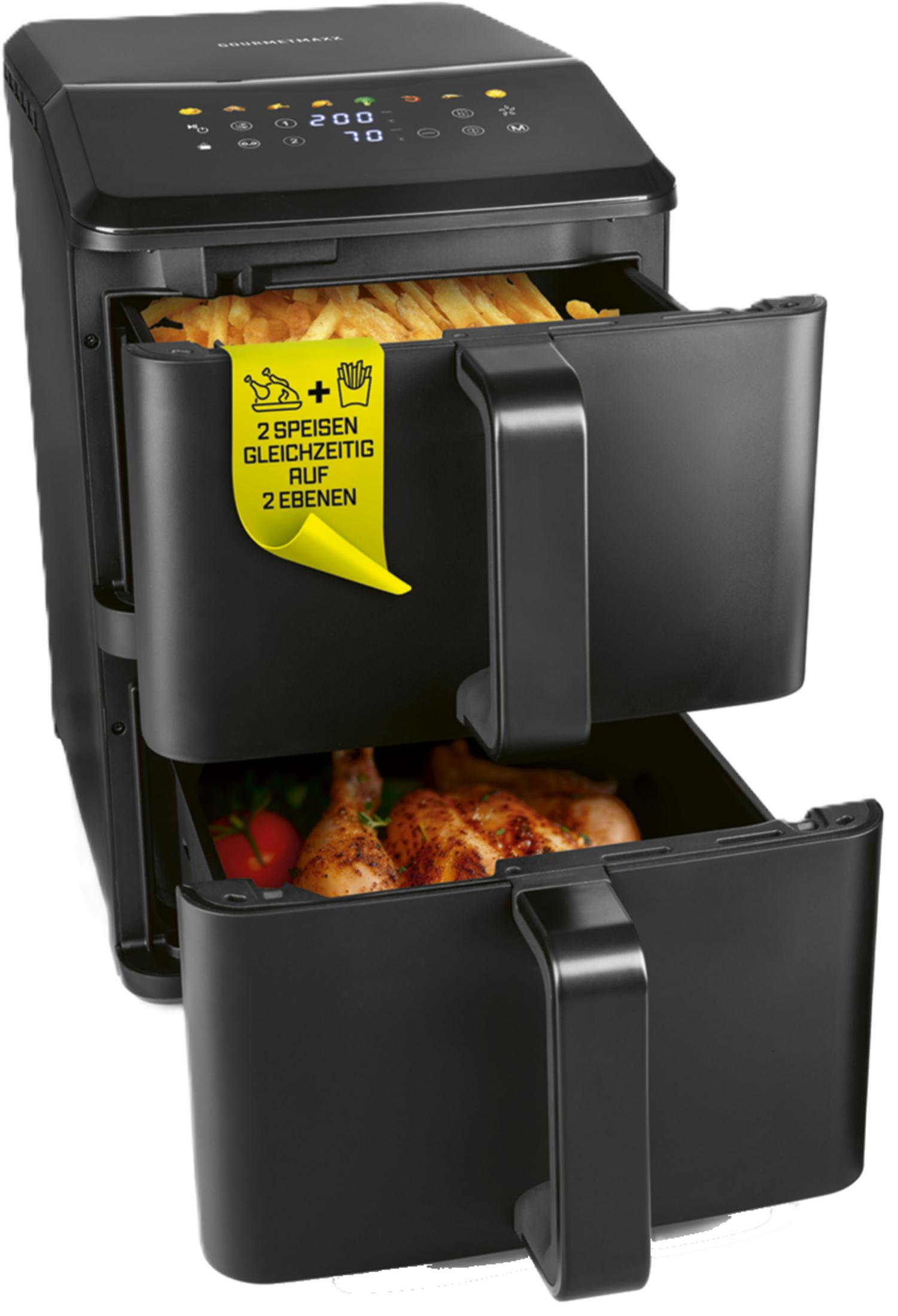 Schwarze Heißluftfritteuse mit zwei Schubladen, gefüllt mit Pommes und Hähnchen.