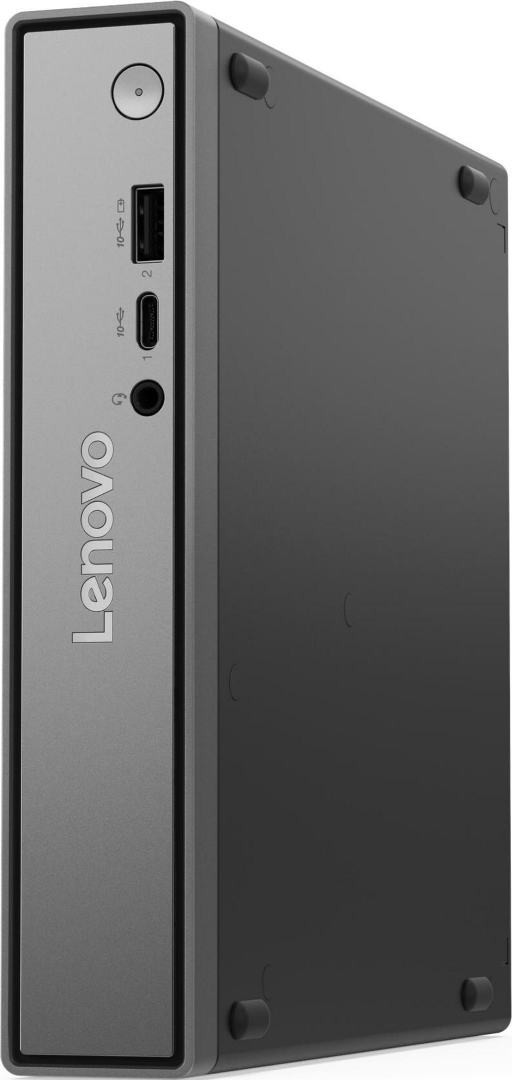 Un mini PC Lenovo grigio con porte USB e cuffie sul davanti.