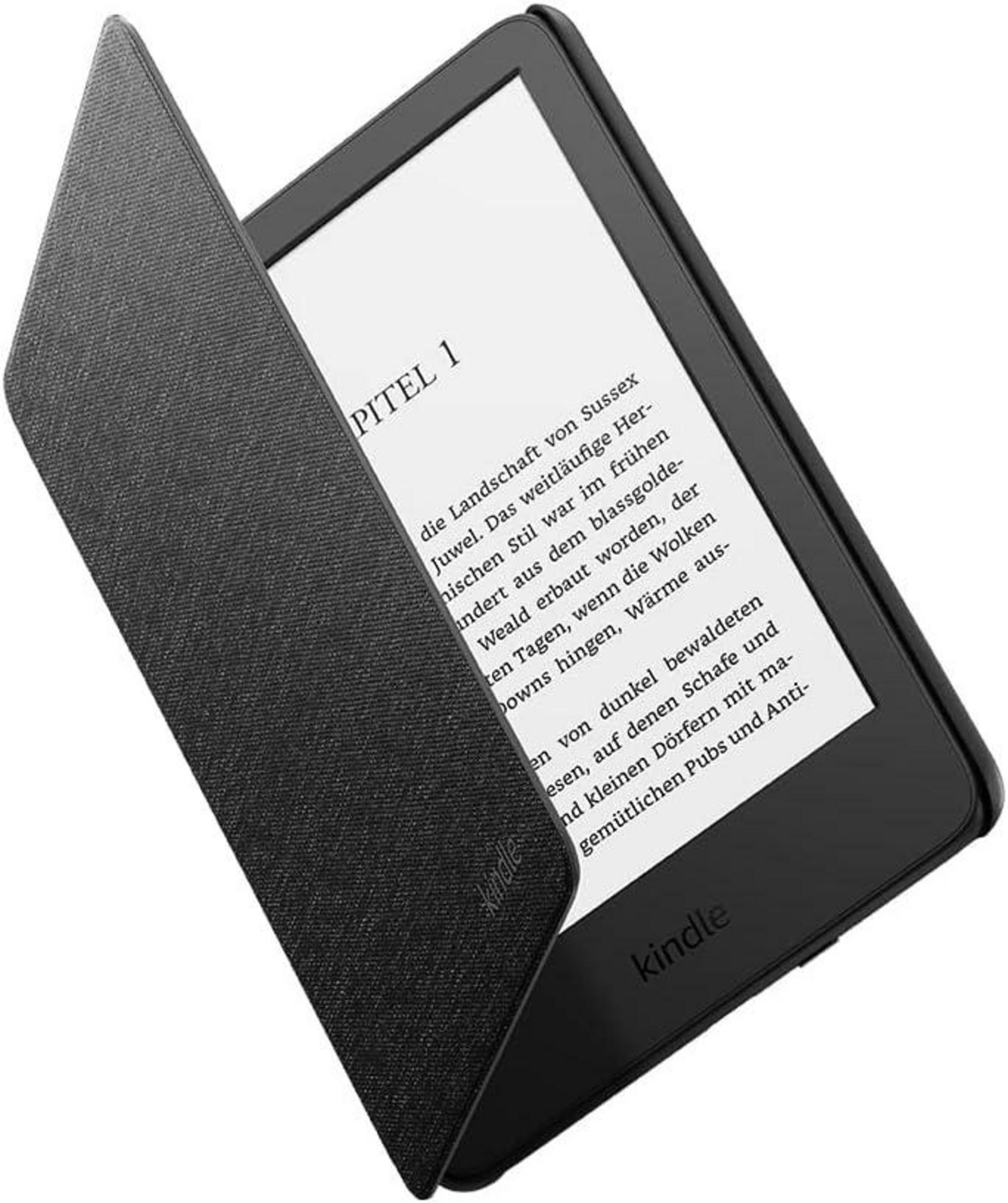 Kapak açık siyah bir Kindle e-okuyucu, ekranda metin gösteriyor.