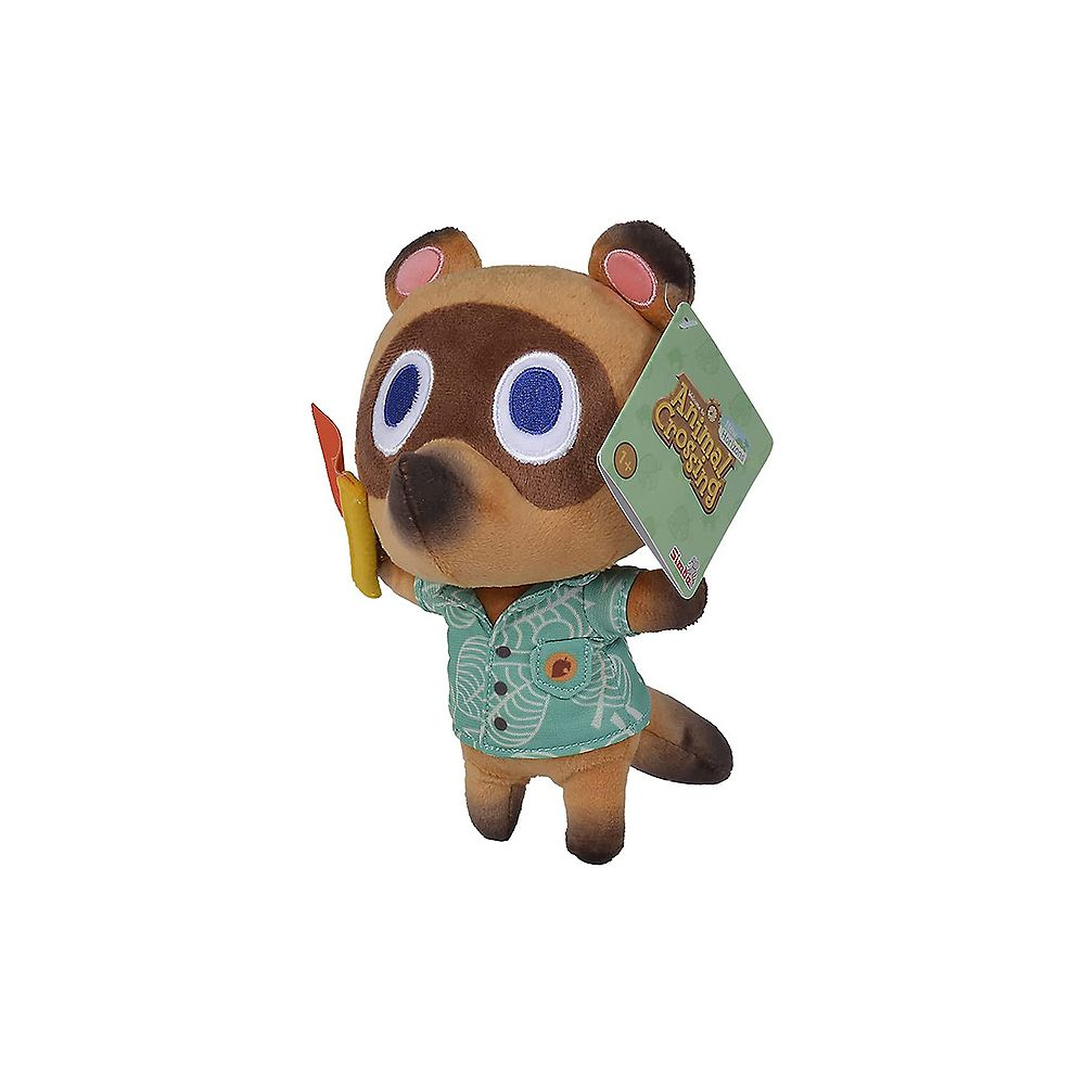 Ein Plüschtier von Tom Nook aus Animal Crossing hält ein gelbes und rotes Objekt.