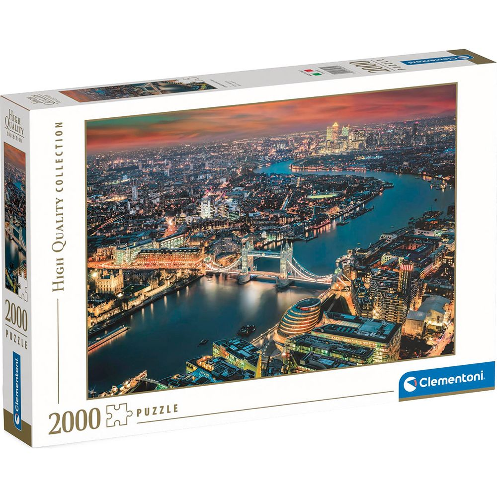 Boîte de puzzle montrant un paysage urbain nocturne avec le Tower Bridge sur une rivière.