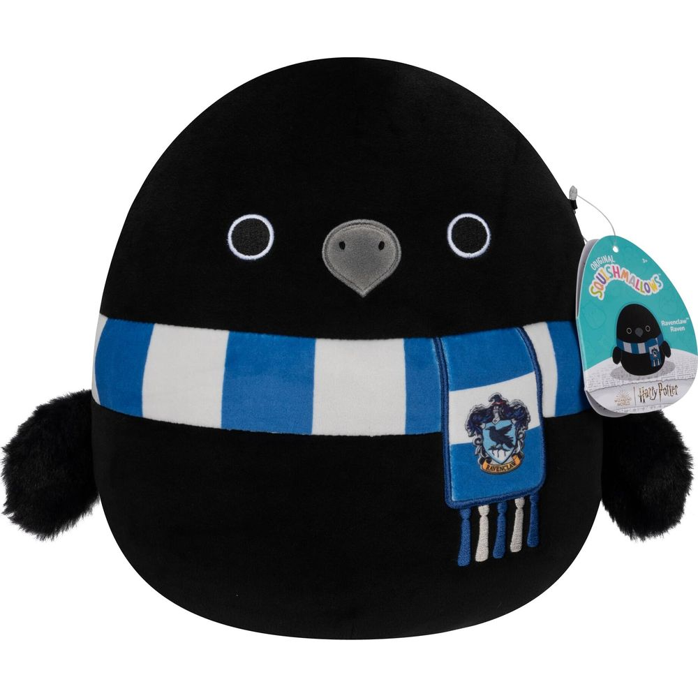 Ein schwarzer Plüschvogel mit blau-weiem Schal und Harry Potter-Logo.
