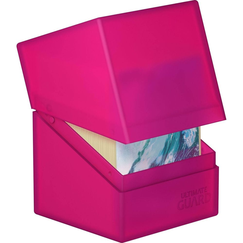 Une boîte de rangement rose chatoyant avec couvercle ouvert contenant des cartes à motif de vagues.