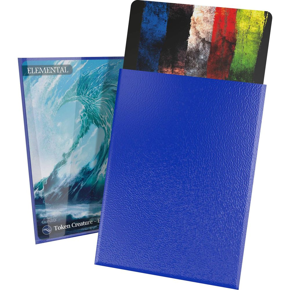 Un classeur bleu contient une carte de jeu avec une vague et une carte à rayures colorées.