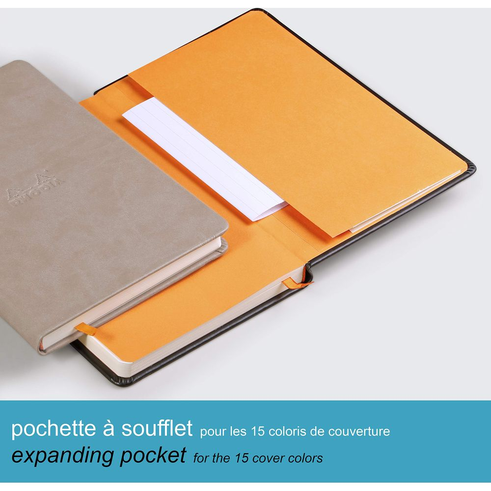 Grauer Notizbuch-Einband mit orangefarbenem Innenfutter und Papierstau.
