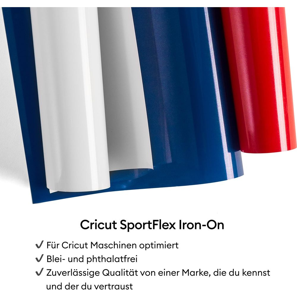 Rollen aus weißem, grauem, blauem und rotem Vinyl-Material nebeneinander.