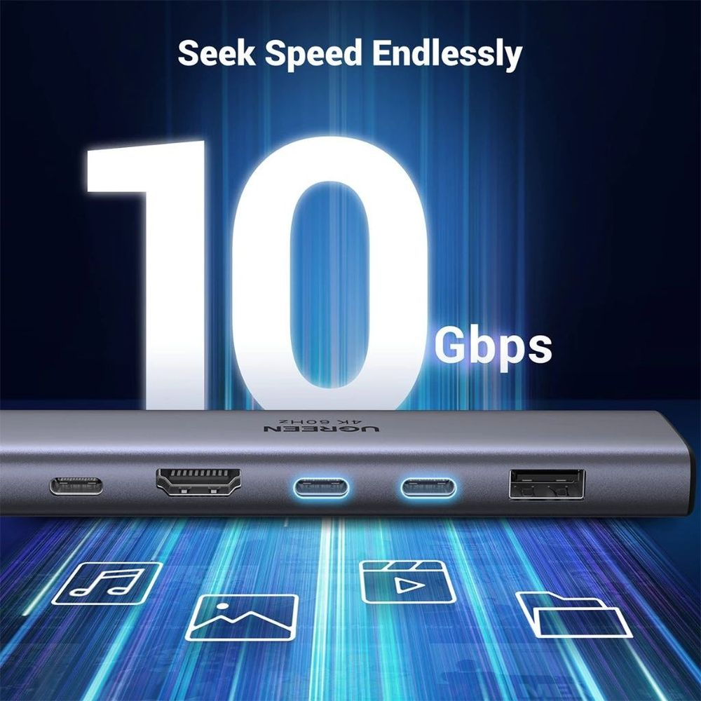 Szara stacja dokująca USB-C z HDMI, USB-A i dwoma portami USB-C.