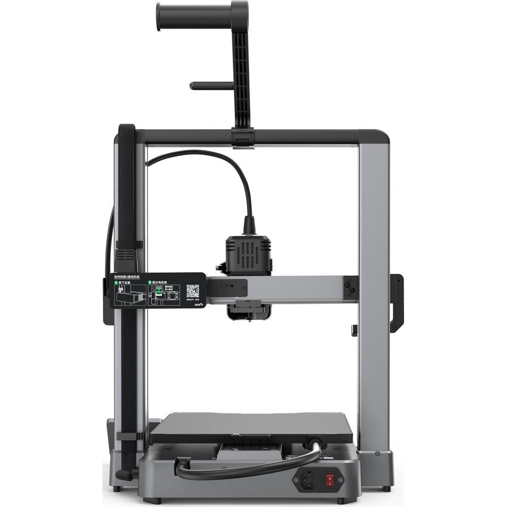 Una stampante 3D argentata con base nera e montanti di supporto verticali.