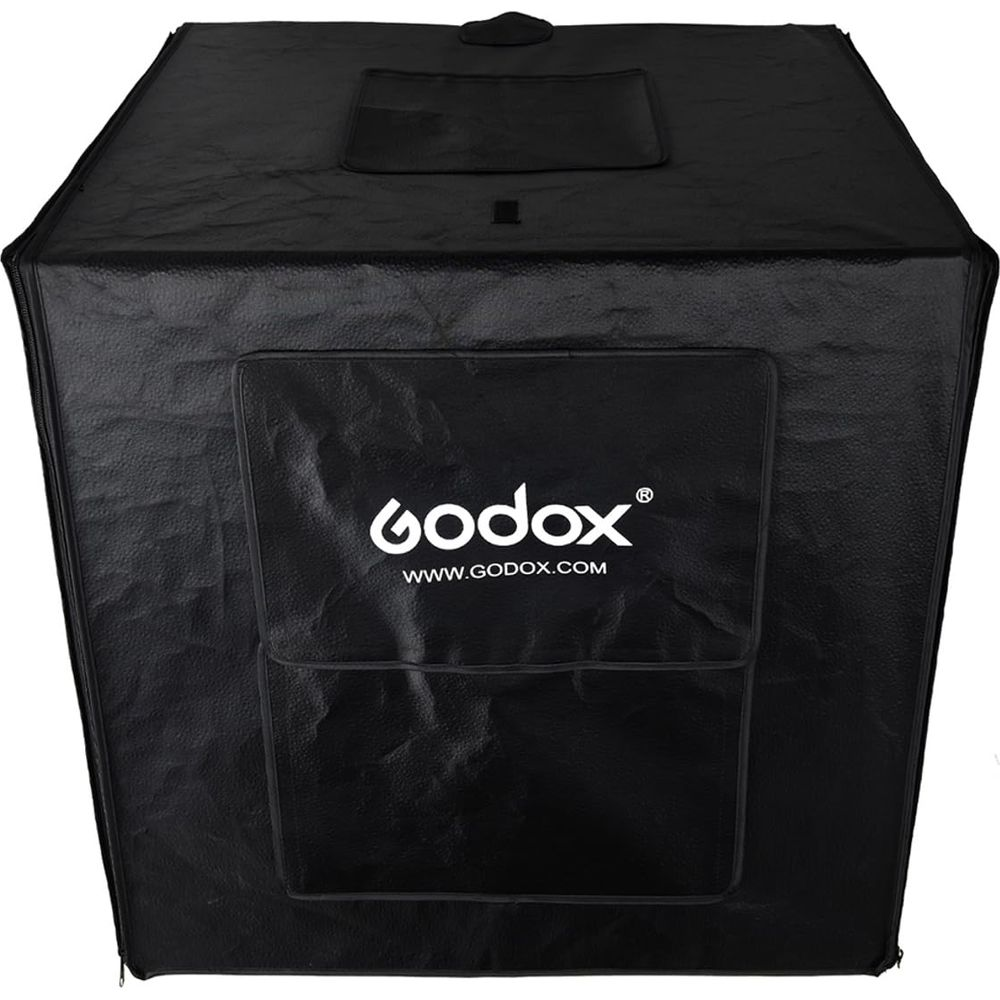 Ein schwarzer Faltlichtwürfel mit dem Godox-Logo und der Website-Adresse.