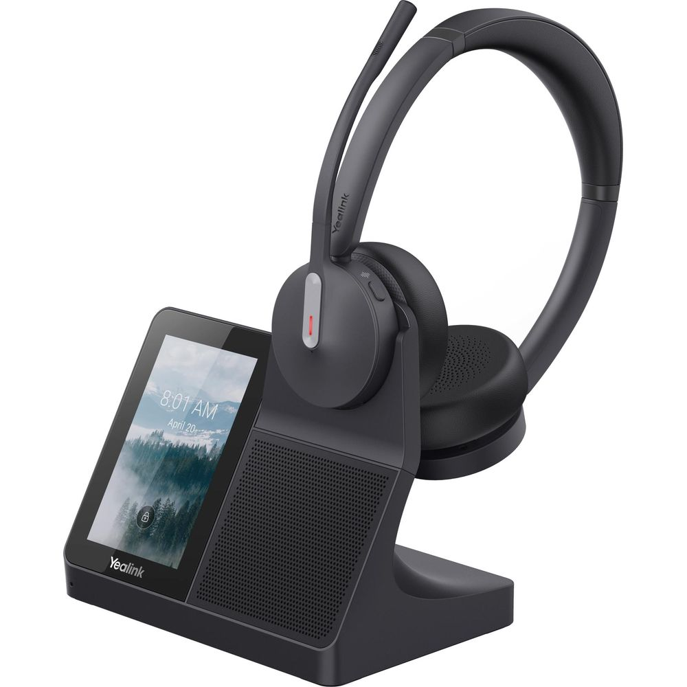 Un casque noir sur une base de chargement avec un écran affichant un paysage.