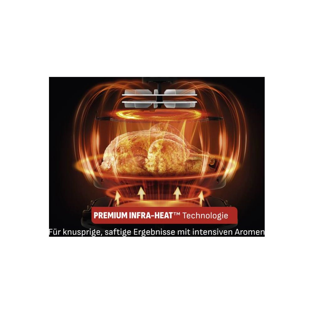 Un pollo intero viene arrostito in una friggitrice ad aria con calore infrarosso.