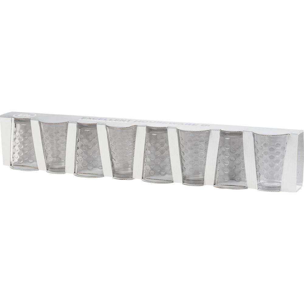 Seis vasos transparentes con patrón de puntos en un paquete blanco.