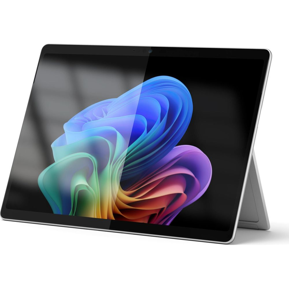 Un tablet argento con uno sfondo astratto colorato sullo schermo.