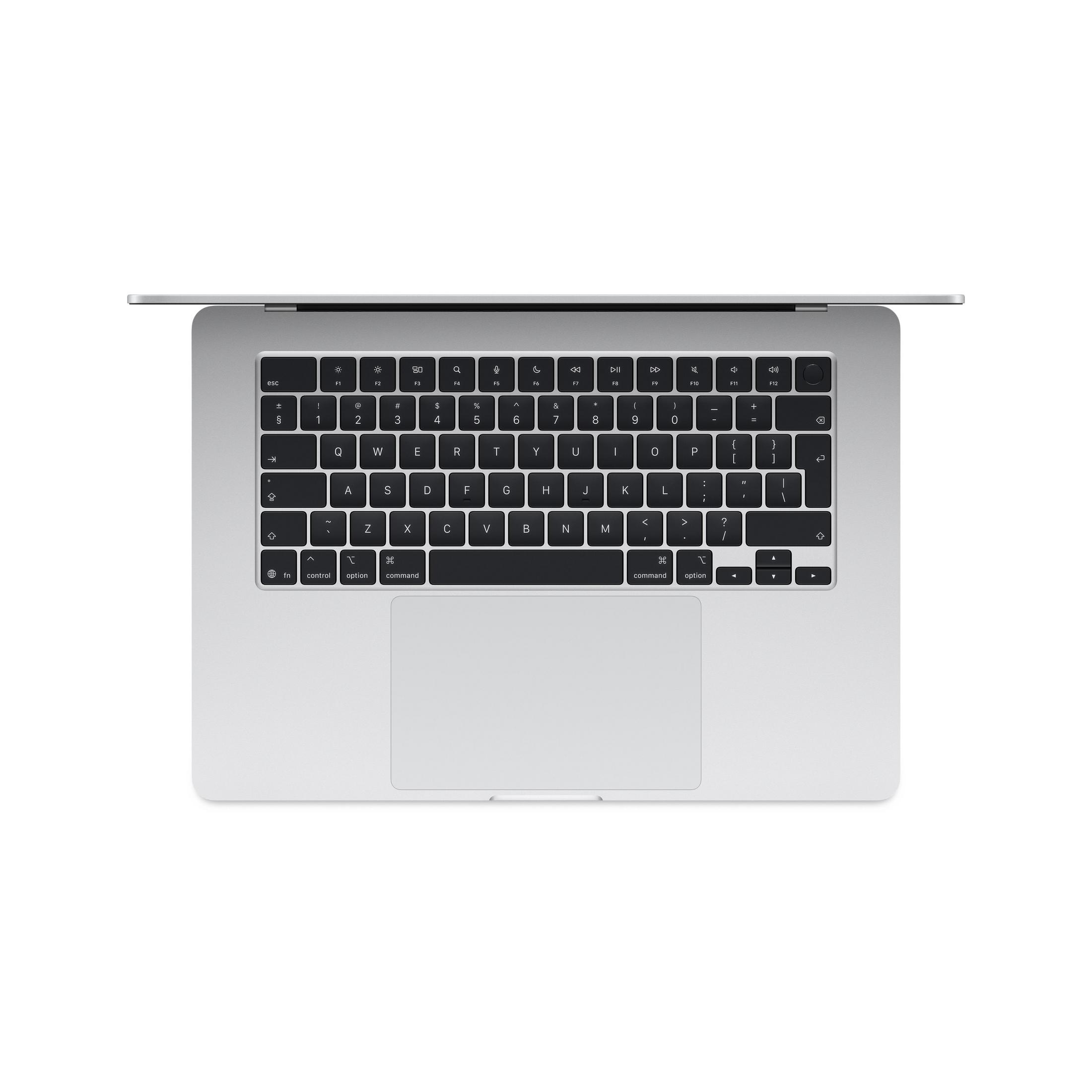 Ordinateur portable argenté vu de dessus, clavier et trackpad visibles.