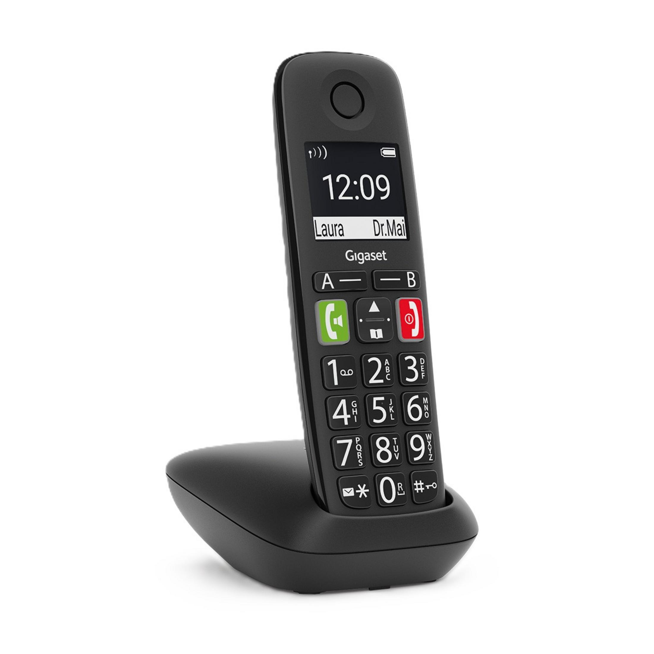 Ein schwarzes schnurloses Telefon mit Tastatur und Bildschirm ruht auf seiner Ladestation.