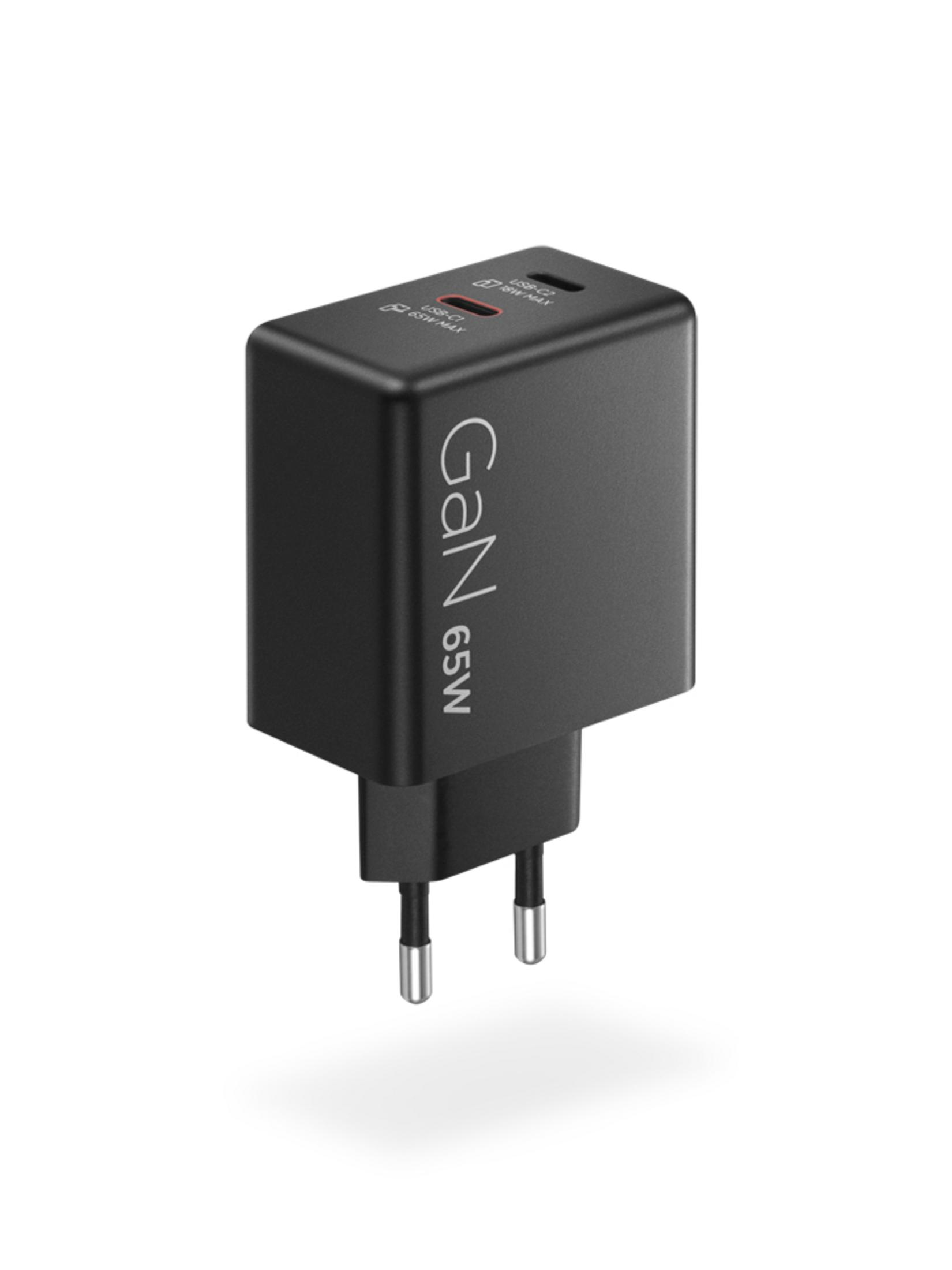 Un chargeur USB-C noir GaN 65W avec deux ports et des broches pliables.