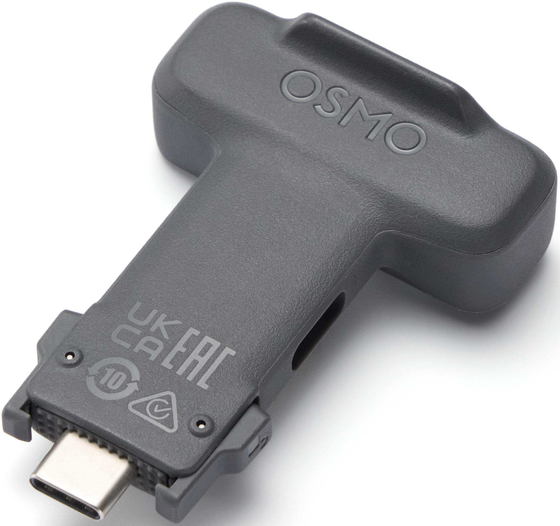 Szary adapter OSMO z portem USB-C i znakami certyfikacji.