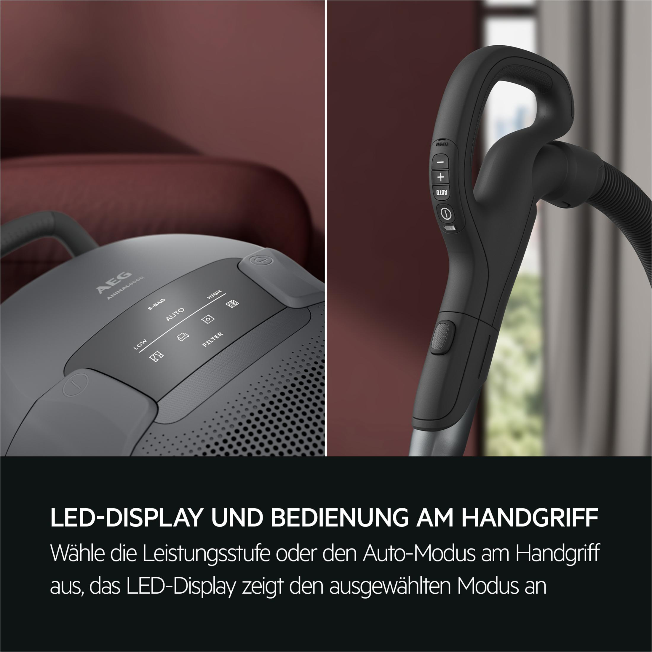 Grauer AEG Staubsauger mit Bedienung am Griff und LED-Display.