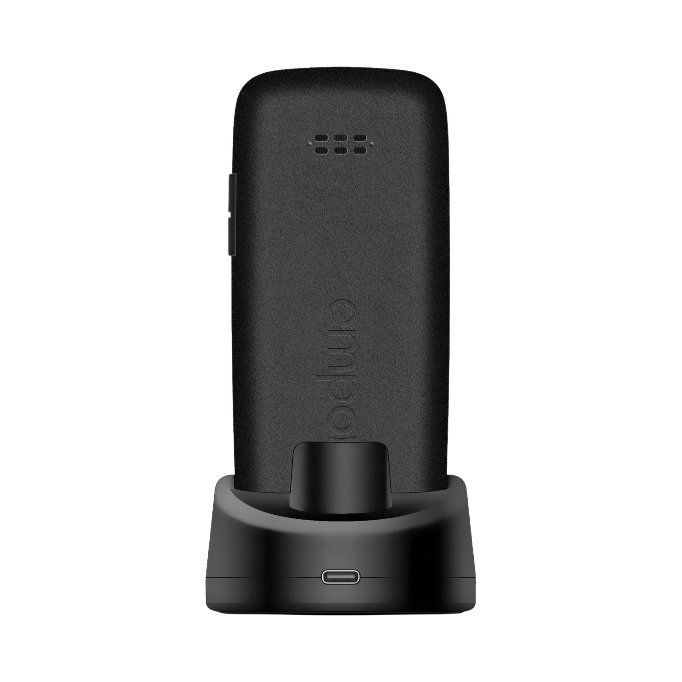 Schwarzes Handy in einer Ladestation mit sichtbarem USB-C-Anschluss.