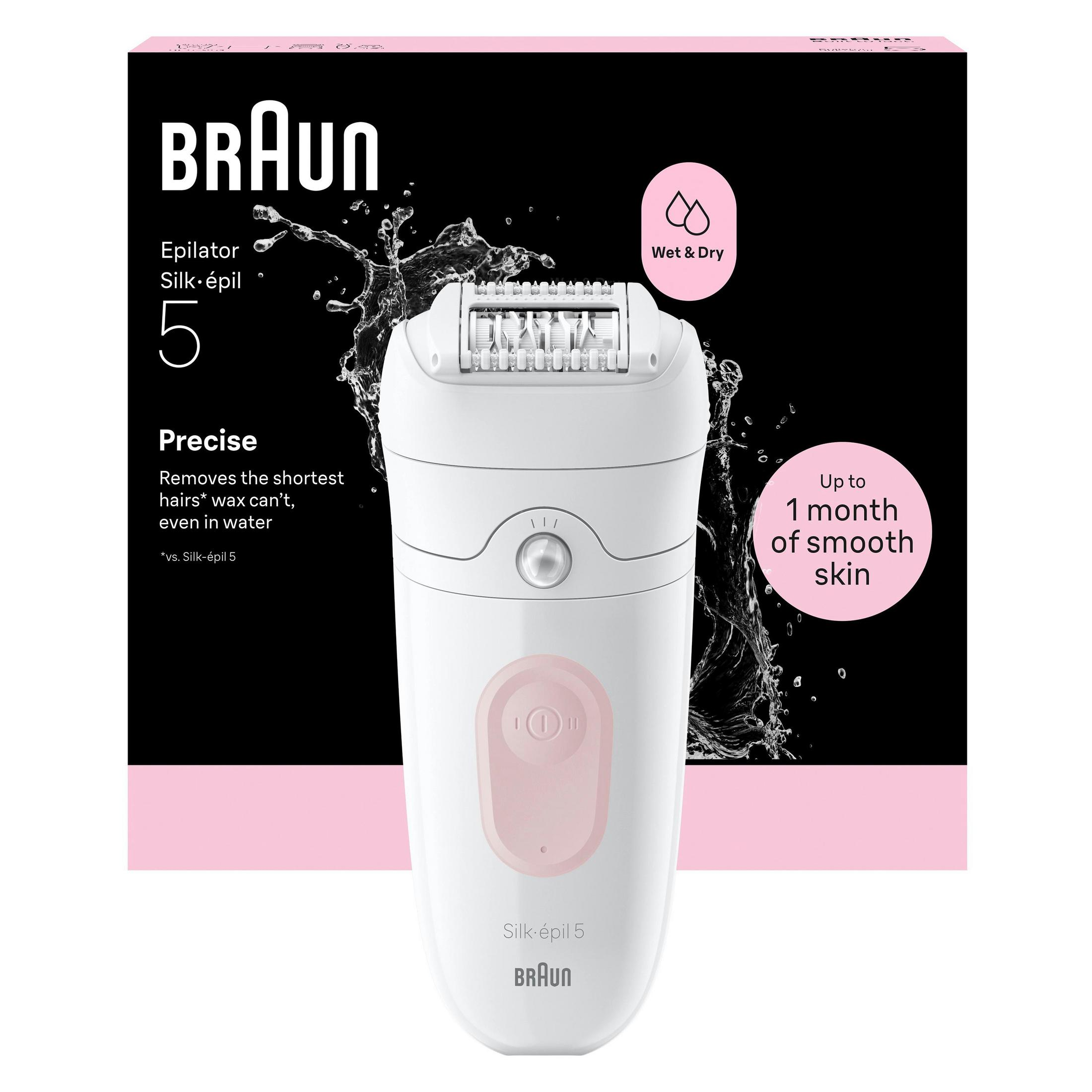 Ein weißer Braun Silk-épil 5 Epilierer mit rosa Akzenten, umgeben von Wasserspritzern.