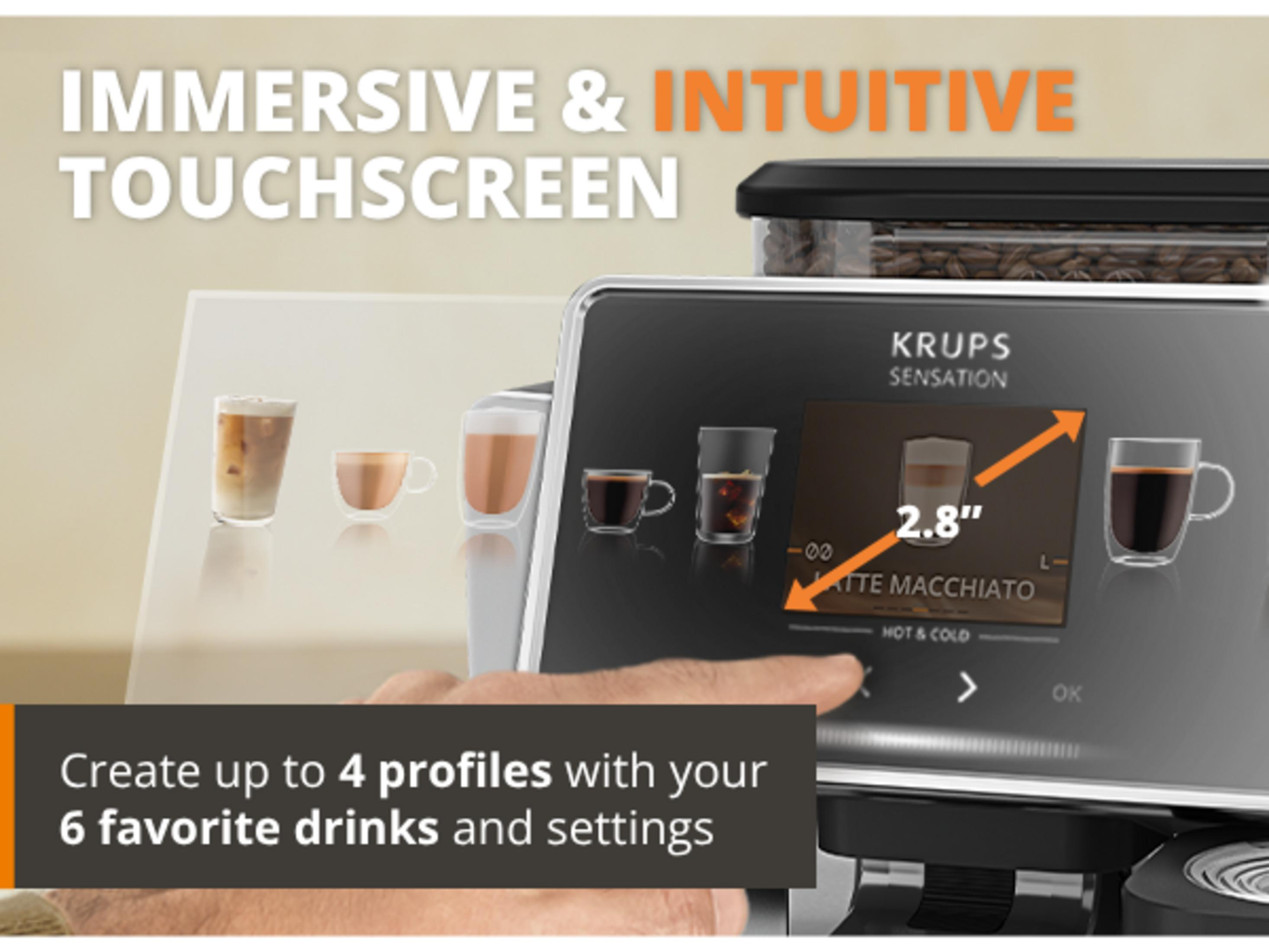 Macchina da caffè Krups con touchscreen, mostra latte macchiato e tazze.
