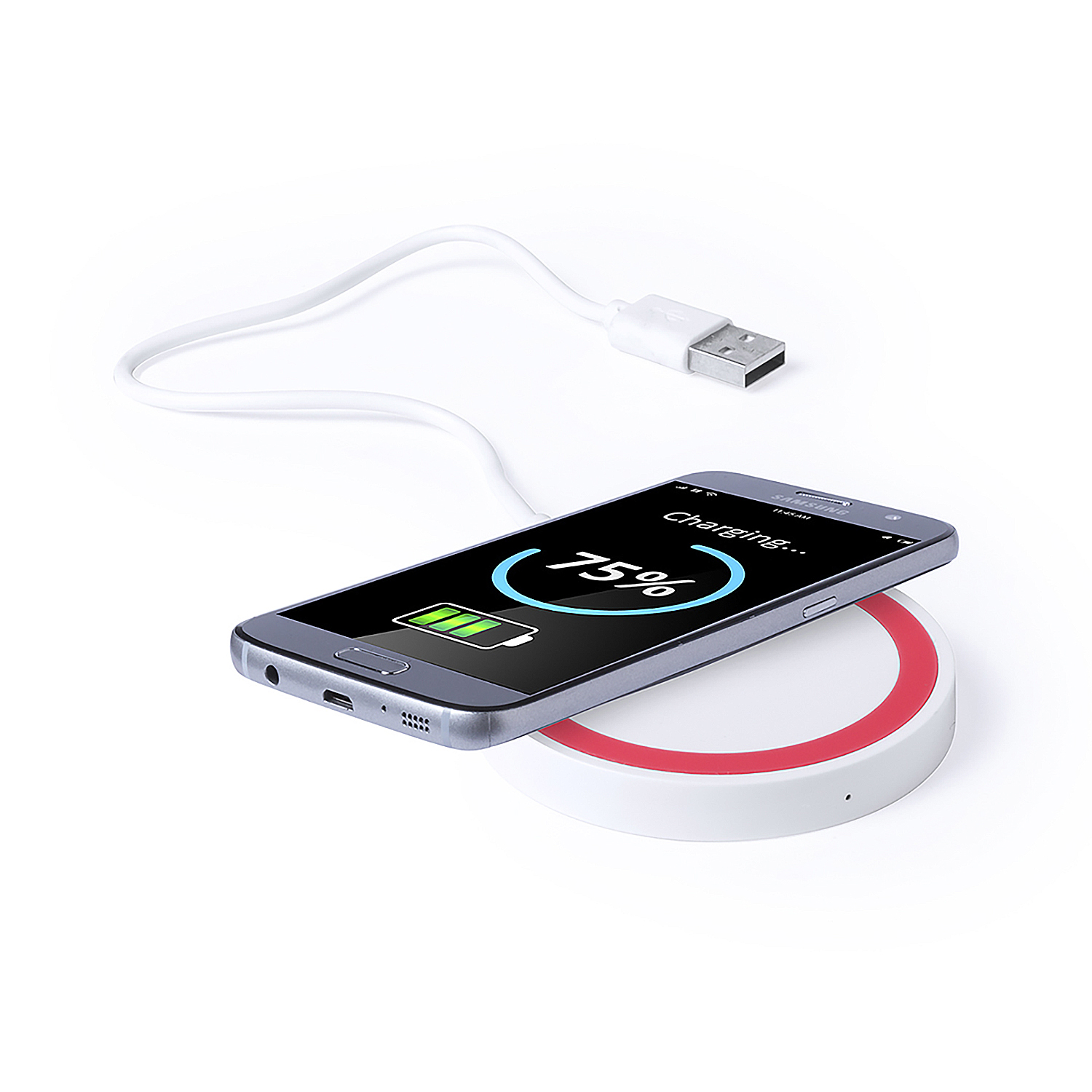 Uno smartphone si sta caricando su un pad di ricarica bianco con anello rosso. Un cavo USB è nelle vicinanze.