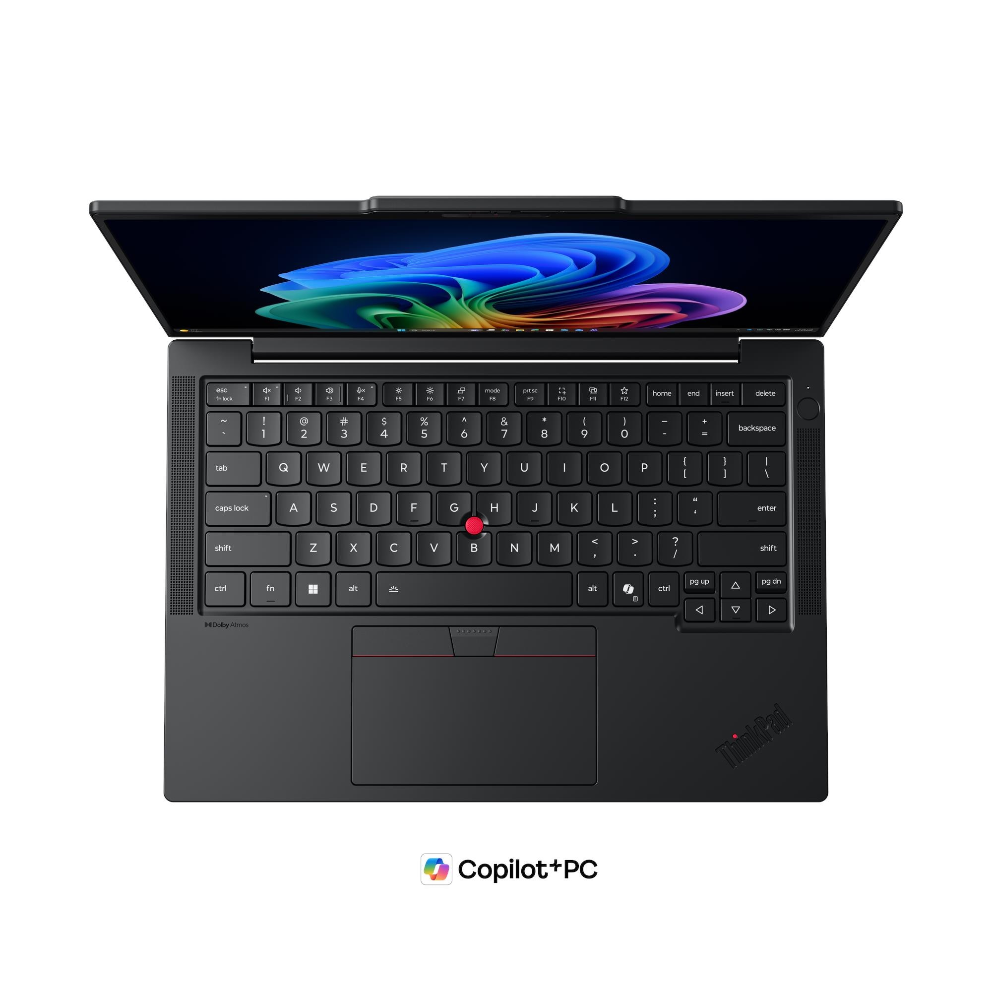 Un laptop nero aperto che mostra uno sfondo colorato sul suo schermo.