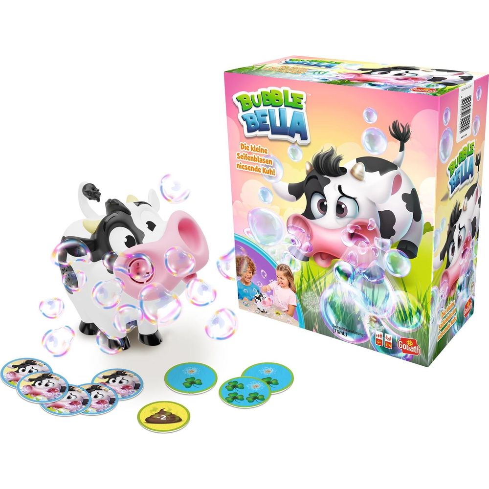 Vache jouet soufflant des bulles à côté de la boîte de jeu.
