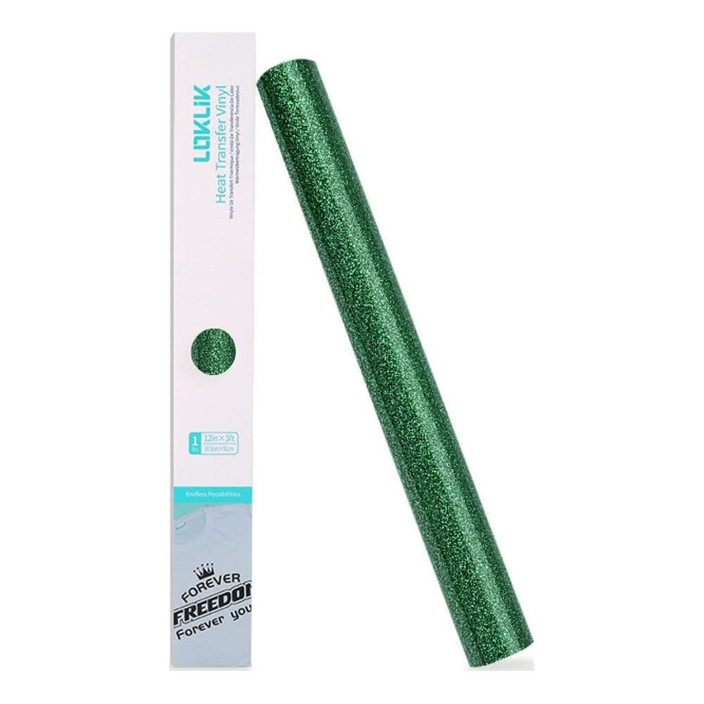 Eine Rolle glitzernder grüner Transferfolie neben einer Verpackung.