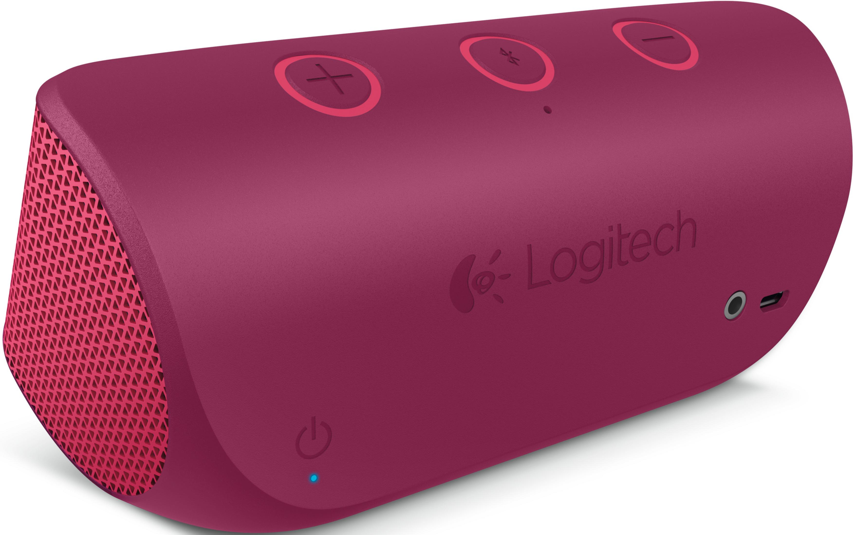 Un piccolo speaker Bluetooth Logitech rosa con griglia a fantasia sul lato.